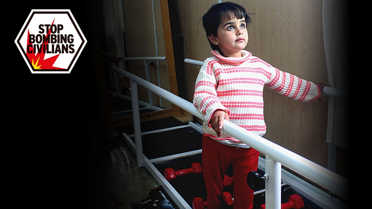 Malak, 5, using parallel bars, Jordan