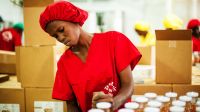 Through Handicap International's livelihoods program in Senegal Faw Seuth Ndiaye was connected with the fruit processing firm, Zena, where she now works as a handler. 