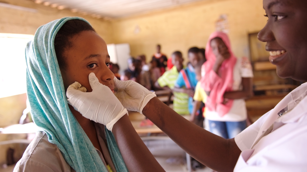 Adama Awa Ba, a twelve-year old school girl, undergoes a medical visit in a primary school in the Patte d’Oie district of Dakar.