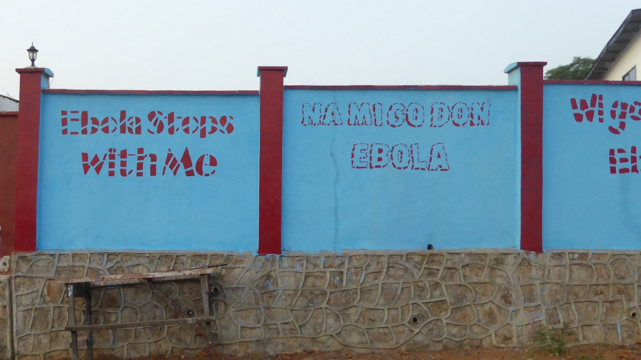 Ebola prevention messages painted on to a wall in Freetown, Sierra Leone.