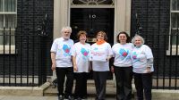 Campaigners at Downing Street (from left to right):  Martin Shirley of South Somerset Peace Group, Cathy Cotteridge, President of SI London Anglia, Barbara Brown of SI Darlington, Beatrice Cami, Head of Fundraising and Communication at Handicap International UK, and Heather Knott of SI Chelmsford.