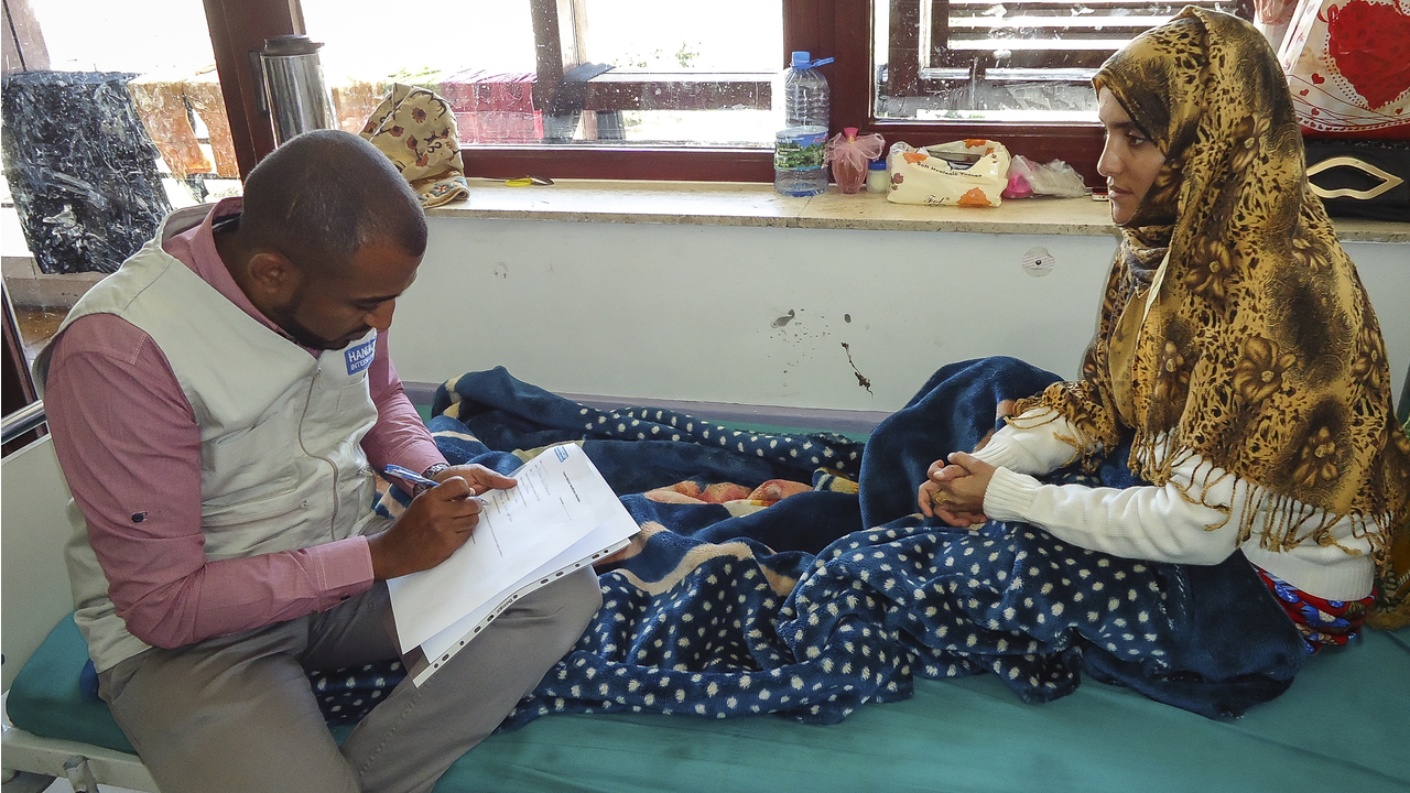 Bushra, 24, on her bed in Al Thawra hospital, Sana,'a. Injured after a bombing on her hometown, she was supported by Handicap International. 